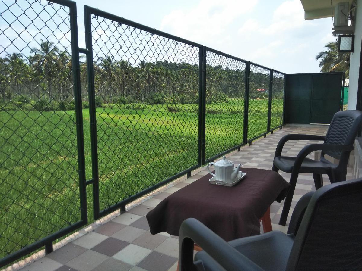 Paddyfield Inn Манантавади Екстериор снимка