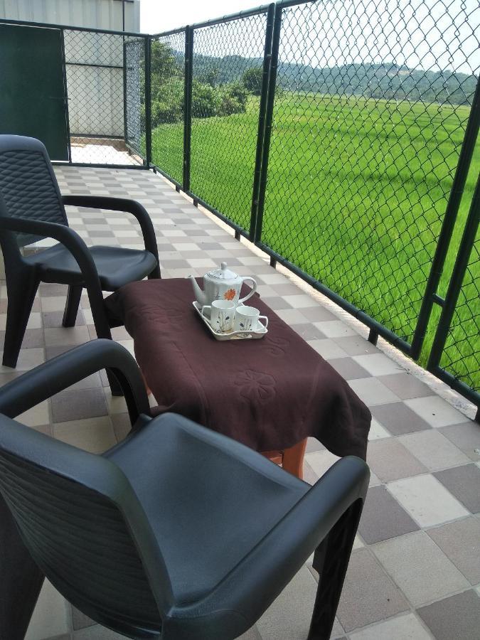 Paddyfield Inn Манантавади Екстериор снимка