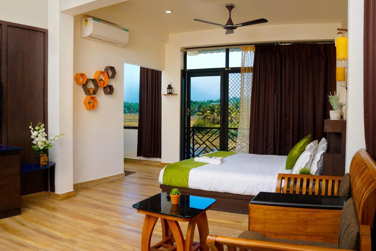Paddyfield Inn Манантавади Екстериор снимка
