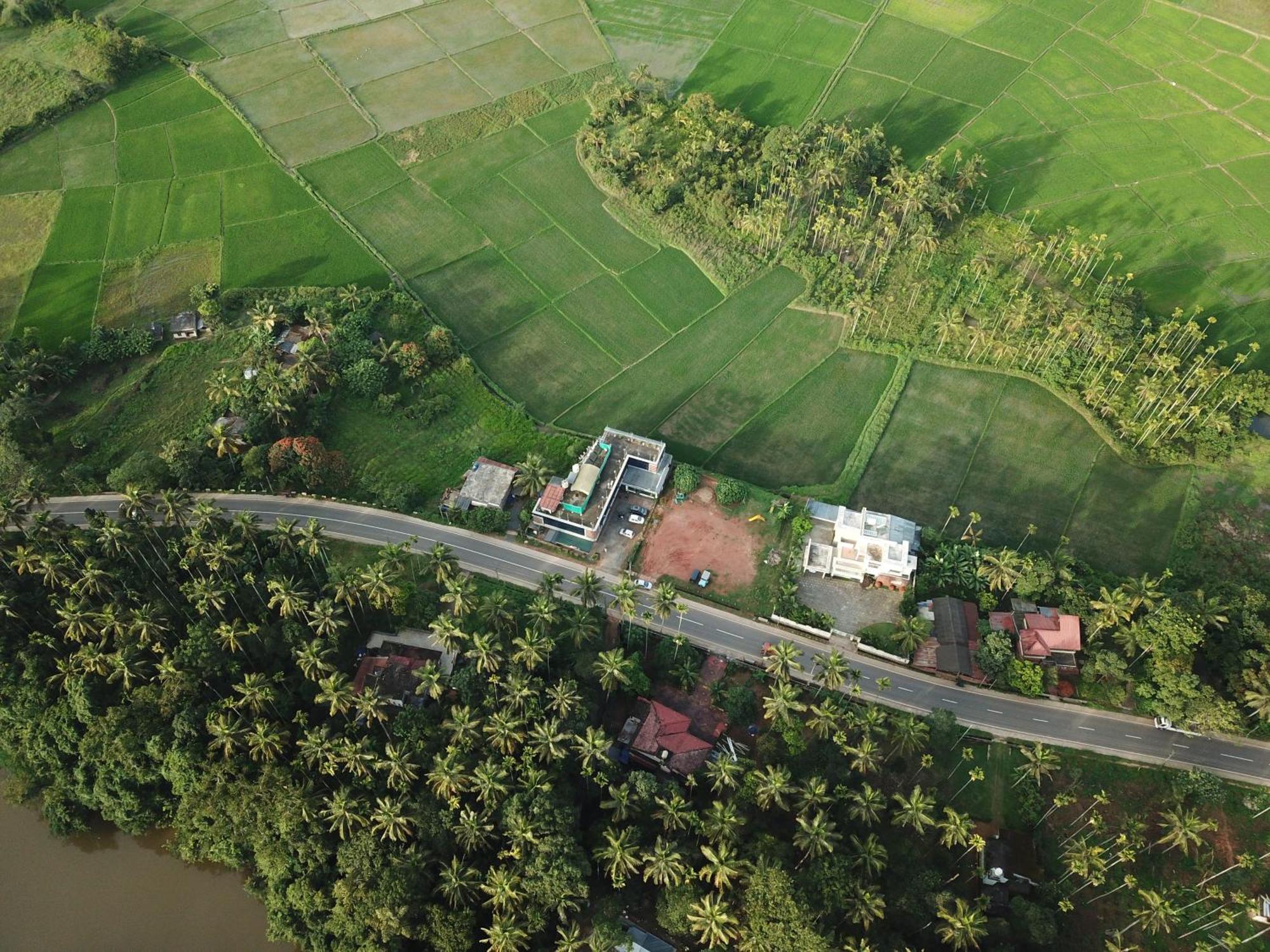 Paddyfield Inn Манантавади Екстериор снимка