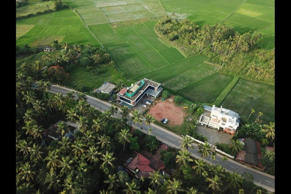 Paddyfield Inn Манантавади Екстериор снимка