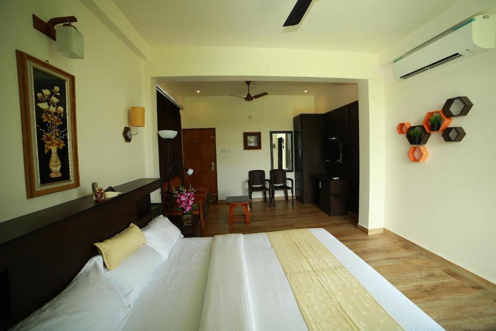 Paddyfield Inn Манантавади Екстериор снимка