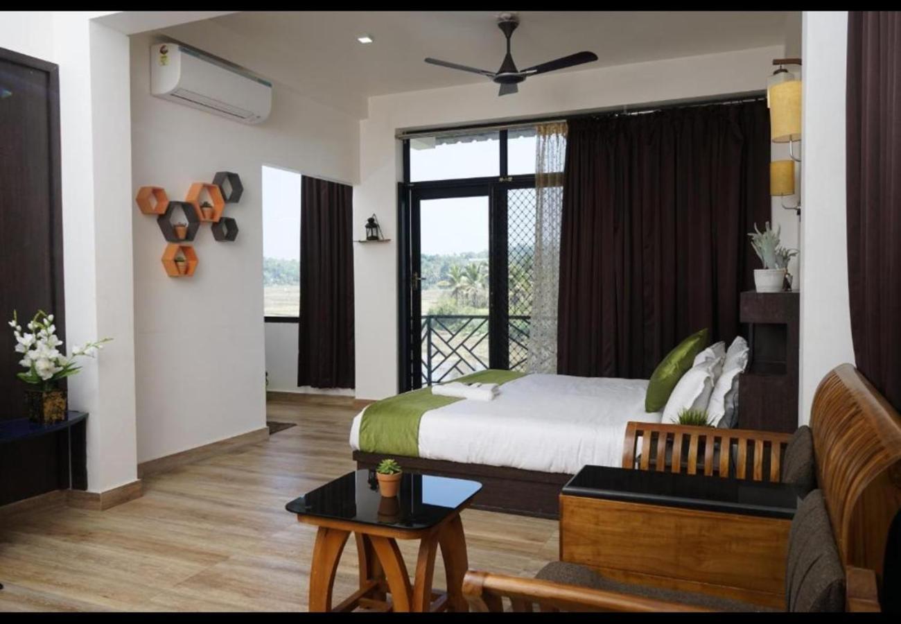 Paddyfield Inn Манантавади Екстериор снимка