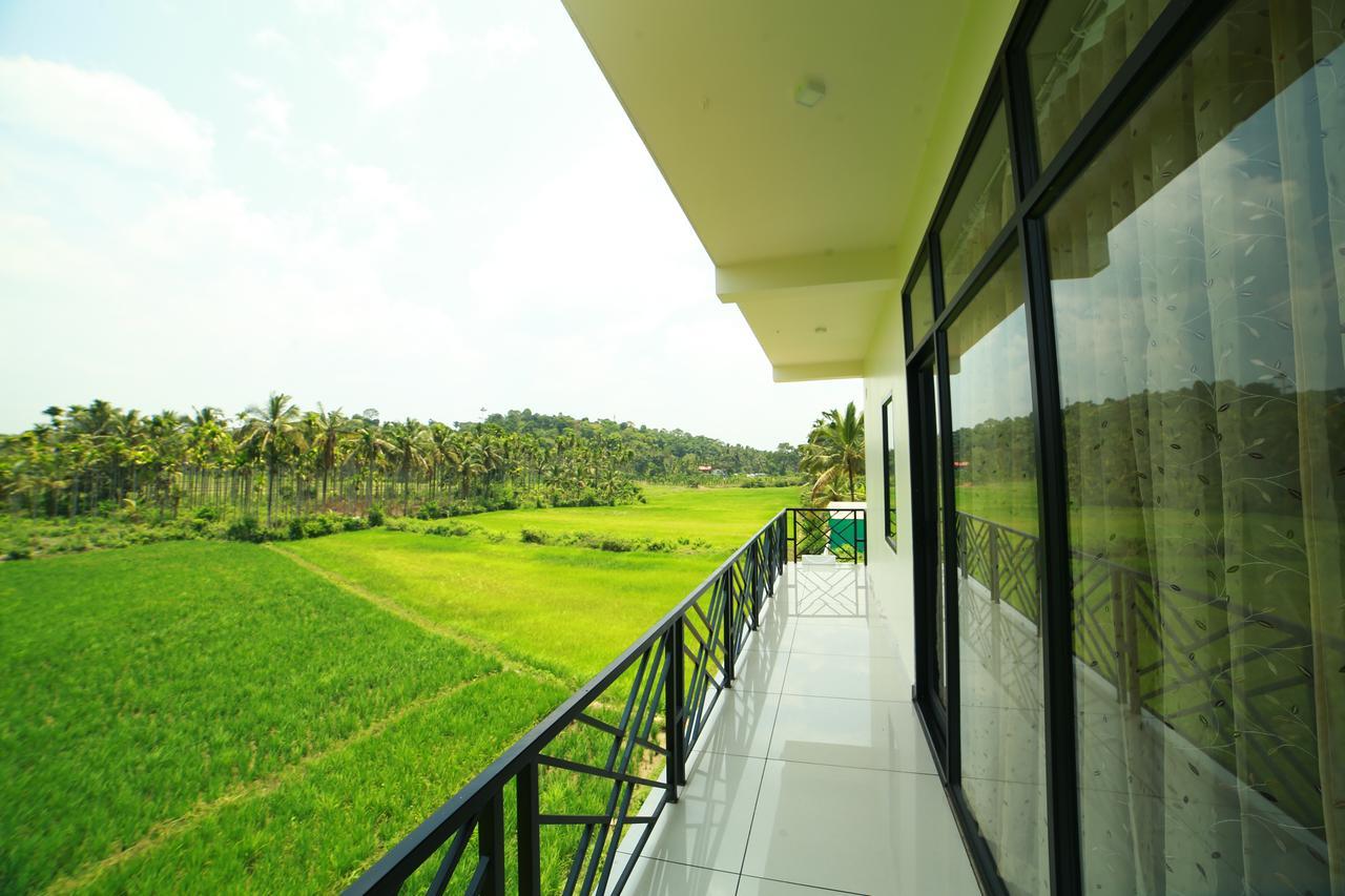 Paddyfield Inn Манантавади Екстериор снимка