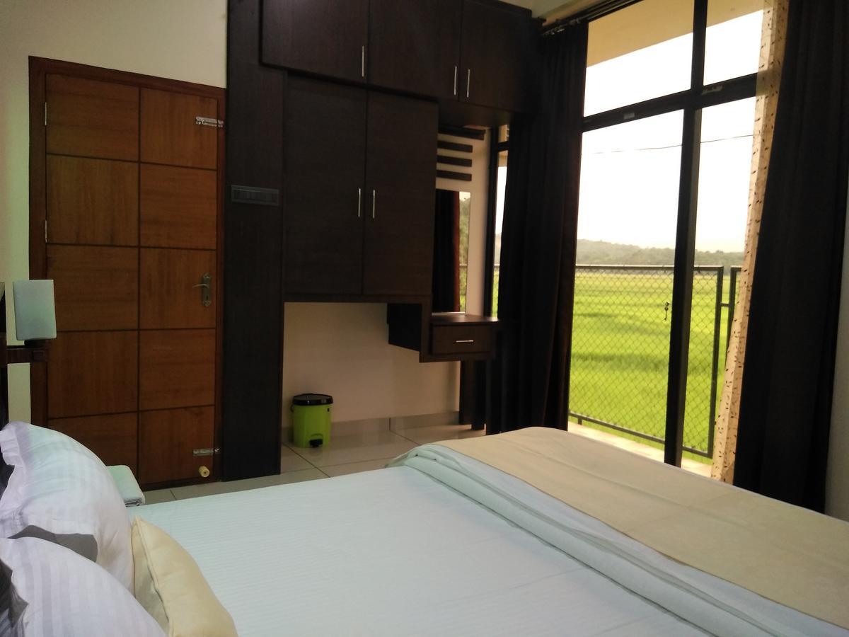 Paddyfield Inn Манантавади Екстериор снимка