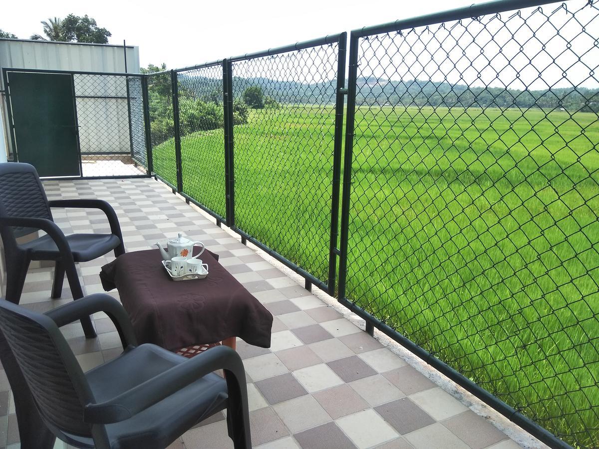 Paddyfield Inn Манантавади Екстериор снимка