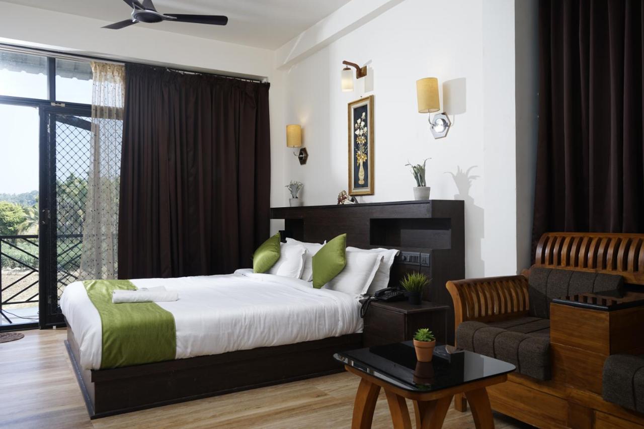 Paddyfield Inn Манантавади Екстериор снимка
